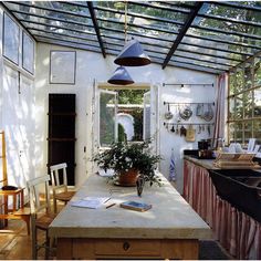 the kitchen is clean and ready to be used as an outdoor dining area for entertaining