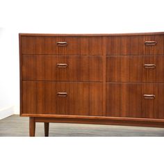 a large wooden dresser with four drawers