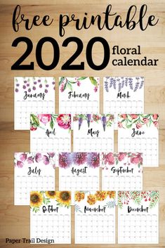 the free printable floral calendar is shown on a wooden surface with flowers and leaves