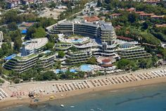 an aerial view of the resort and beach