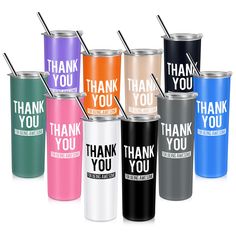 many different colored stainless steel tumblers with thank you written on the side and one has a straw in it