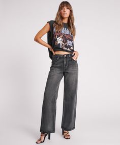 The MID WAIST WIDE LEG JACKSONS. 90s vibes all night long. The ultimate easy to wear baggy jeans. Straight through the hips with a cool but still subtle wide leg flare. FADED BLACK is our ultimate black distressed denim wash, designed with more sustainable recycled denim. RECYCLED DENIM. New more sustainable fabrics. This style is crafted using 20-30% recycled denim cotton offcuts, normally wasted in production & instead re-woven into new denim. Better for the planet. Model wears a size 26 ( Planet Model, Low Waist Skirt, Wide Leg Denim Jeans, Leather Jacket Dress, Boyfriend Fit Jeans, 90s Vibes, Recycled Denim, One Teaspoon, Summer Fits