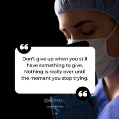 a woman wearing a surgical mask and holding a cell phone to her face with the caption don't give up when you still have something to give