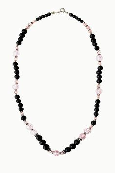 Amour Black Onyx and Pink Crystals Necklace is a gorgeous accessory that infuses your life with inspiring love and passion. Black Onyx offers powerful protection by absorbing and transforming negative energy, while Pink Crystals attract love, healing, and passion. Oxidized sterling silver beads and spacers add an elegant touch to this beautiful balancing and healing necklace. Black Onyx: Endurance, Perseverance, Grounding Pink Crystals: Love, Healing, Passion Hallmarked Metal: 925 Sterling Silve Black Necklace With Healing Gemstone Beads, Black Gemstone Beads Necklace For Healing, Black Necklace With Gemstone Beads For Healing, Black Necklaces With Gemstone Beads For Healing, Black Gemstone Crystal Necklace For Spiritual Use, Black Spiritual Crystal Necklace With Gemstone, Spiritual Single Strand Black Jewelry, Spiritual Black Crystal Necklace With Gemstone, Spiritual Black Gemstone Crystal Necklace