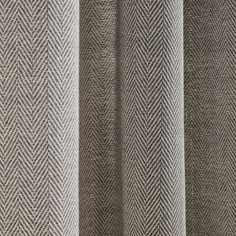 the side of a gray and white checkered curtain