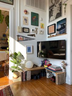 a television mounted on the wall in a living room