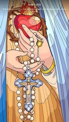 a woman holding a cross with pearls on her hands and the words may 05, 2012