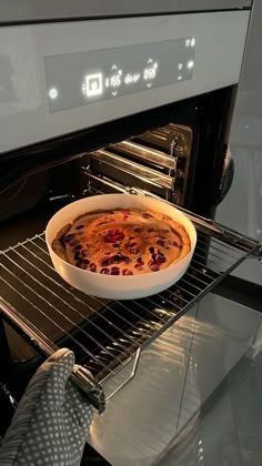 a pie is being cooked in an oven