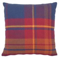 a red and blue plaid pillow on a white background