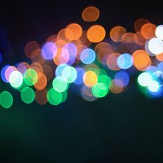 blurry image of colorful lights in the dark