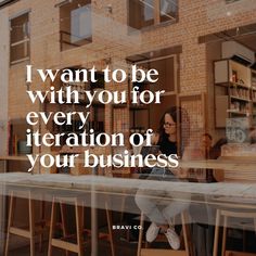 a woman sitting at a table in front of a brick building with the words i want to be with you for every interaction of your business