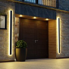 a large planter sitting in front of a brown door