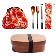 a wooden box with utensils, spoons and an orange paisley print bag