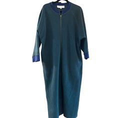 Vintage 1980s Christian Dior Blue Green Long-Sleeve Zip-Up Fleece Robe Medium Elevate your wardrobe with this Christian Dior fleece robe. The long sleeves and zip-up design offer comfort and style for cooler days.  A great vintage piece from the past, this retro robe will keep you warm and stylish in the colder weather.  The item has been laundered according to garment specifications. * Long sleeves * Full zip-up closure * Medium size * Fleece material * Contrasting collar and cuffs * Ankle length Content: unable to see due to wear on tag Measurements: Armpit to armpit: 25" Back of collar to bottom hem: 51" We ship most items out the next business day.  Please contact us with any additional questions.  We are happy to combine shipping when possible. Thank you! 2378 Features: * Robe Size: W Fleece Robe, Pajama Robe, Wakefield, Womens Robes, Collar And Cuff, Zip Up, Medium Size, Cold Weather, Christian Dior