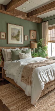 a bedroom with green walls and white bedding