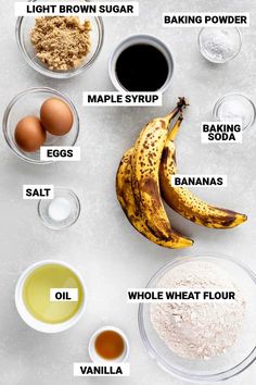 ingredients to make banana bread laid out on a white surface with words describing the ingredients