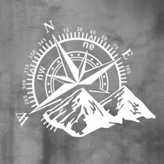 a black and white photo with a compass on it