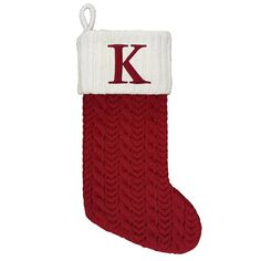 a red and white stocking with the letter v on it