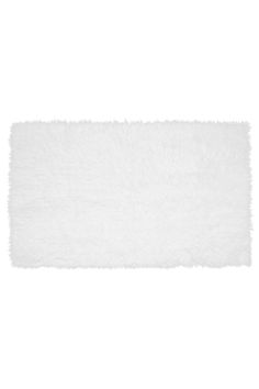 a white fluffy rug on a white background