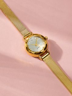 This dainty round face watch, features a slim gold mesh wrist band. Slim in style, this watch is perfect to add to a wrist stacked with bracelets or alone for a sophisticated style. Slim Watches, Wrist Stacks, Timeless Watches, Small Watch, Gold Watches Women, Wrist Band, Jewelry Lookbook, Mini Dress Shop, Christmas Gifts For Women