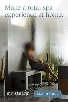 a woman sitting on a bench in front of a glass wall with the words make a total spa experience at home