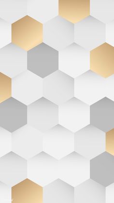 an abstract white and gold background with hexagonal shapes