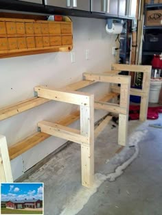 three wooden shelves in a garage with tools on the floor and one shelf is made out of plywood