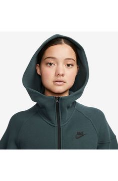 Stay cozy and warm without the extra bulk in a full-zip hoodie made from lightweight tech fleece and finished with convenient zippered pockets. 25" front length; 27" back length (size medium) Front zip closure Fixed hood Front zip pockets 53% cotton, 47% polyester Machine wash, tumble dry Imported Nike Functional Fleece Hoodie, Nike Athleisure Fleece Jacket With Drawstring Hood, Nike Sporty Hooded Fleece Jacket, Nike Functional Sweatshirt With Drawstring Hood, Nike Hooded Running Hoodie, Nike Hooded Jacket For Gym With Drawstring Hood, Nike Long Sleeve Hoodie For Running, Nike Hooded Jacket With Drawstring Hood For Gym, Nike Functional Sweatshirt With Adjustable Hood