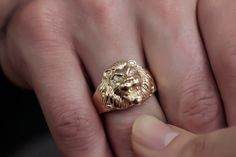 14K Solid Gold King of the Beasts Ring For Wild Animal Lover Men, Male Lion Head Gift Ring For Men Lion Lovers, Birthday Gift Ring For Him, 10K Gold Big Lion King Head Animal Ring, Solid Gold Roaring Big Lion King Diamond Unisex Ring, Solid Gold Lion Band Ring, 10K 14K 18K Gold Animal Relief Ring, Men Women Gift, Handmade Lion Ring, Stylish Leo Zodiac Jewelry, Handmade Promise Ring, Best Quality, Affordable Prices by Joy Jewelry NY, Always Dainty, Beautiful, Delicate Engagement Rings in Real Solid Gold, Not Vermeil or Plated. Ring Features: ✪ 14K Solid Gold (also in 8, 9, 10, 18K) ✪ Band Options: Yellow Gold, White Gold, Rose Gold ✪ Top Width: 19.15 mm ✪ Band Width: 3.98 mm ✪ Thickness: 1.60 mm ✪ Gemstone: AAA+ Grade High-Quality White Cubic Zirconia ✪ Stone Size: 2mm  (2 stone) ✪  Setting Lion Rings For Men Gold, Rose Gold Top, Delicate Engagement Ring, King Diamond, Lion Ring, Animal Ring, Birthday Gift Ring, Gold Animals, Male Lion