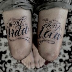 two people with tattoos on their legs that say, i am the wild one and are standing next to each other