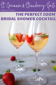 the perfect zoom bridal shower cocktail is served in wine glasses and garnished with strawberries