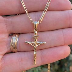 Embrace Timeless Style And Faith With Our Rustic Cross Necklace, Featuring A Uniquely Crafted Cross With A Diamond Cut Design That Adds A Touch Of Brilliance To Its Rugged Charm. Paired With A Classic Valentino Chain, This Necklace Is Both Versatile And Elegant, Making It A Perfect Accessory For Both Men Product Details Material: 14k Gold Filled Metal Purity: 14k Chain Size: 24" Inches Chain Thickness: 2.3mm Pendant Size: 33x18mm Chain Style: Figaro Link Gender: Male Clasp Type: Lobster Claw Age Men’s Crucifix Necklace, Jewelry Men Gold, Mens Gold Cross Necklace, Gold Cross Chain For Men, Necklace Men’s Gold, Gold Mens Jewelry, Jewelry Men Aesthetic, Cross Chain Men, Gold Jewelry Men