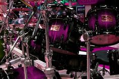 a purple drum set on display in a store