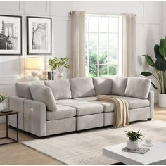 a living room scene with focus on the sectional sofa