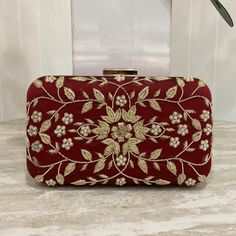 Introducing our designer Handmade clutches. With detailed intricate work, these purses are perfect for a daily wear as well as party wear. Comes with a detachable chain, you can easily switch from a hand purse to a crossbody. Spacious enough to fit daily essential needs as well as all kind of Phones. This gorgeous clutch in Navy Blue with detailed embroidery is such an elegant piece. ALL SALES ARE FINAL. KINDLY MESSAGE ME FOR ANY INQUIRIES. Red Bags For Diwali Party, Gold Evening Bag For Diwali, Rectangular Red Clutch With Handwork, Red Rectangular Clutch With Handwork, Red Rectangular Festive Clutch, Chic Rectangular Evening Bag For Festive Occasions, Evening Clutch Bag For Diwali, Festive Clutch For Events, Designer Festive Gold Clutch