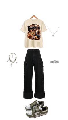 a white shirt, black pants and sneakers are arranged in the shape of a t - shirt