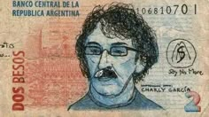 an old mexican bank note with a drawing of a man in glasses on it's face