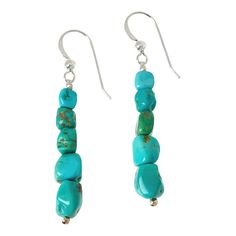 Jay King Sterling Silver Peruvian Turquoise Bead Drop Earrings  Beautiful blue-green nuggets of Peruvian turquoise help these dangling drop earrings add a fun pop of color to any outfit. From Jay King.       Approx. 2"L x 5/16"W     Stamped .925     Pierced with wire backs     Earrings have nugget-shaped turquoise beads strung together in linear drops   Stone Information       All sizes and weights approximate     Stabilized Blue-Green Turquoise - Nugget (5x5mm to 8x9mm); mined in Peru Turquoise Dangle Jewelry With Natural Stones, Turquoise Dangle Jewelry, Turquoise Long Drop Earrings With Ear Wire, Hypoallergenic Turquoise Dangle Jewelry, Hypoallergenic Turquoise Beaded Dangle Earrings, Southwestern Turquoise Jewelry With Ear Wire, Turquoise Drop Earrings With Dangling Beads, Turquoise Dangle Earrings With Natural Stones, Turquoise Hypoallergenic Beaded Drop Earrings