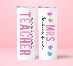 two personalized white tumbles with hearts and the words teachers on them against a pink background