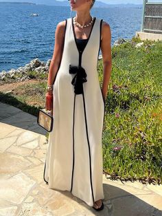 White Vest Dress For Summer, Elegant Summer Dress With Vest, Elegant Summer Vest Dress, Elegant Summer Dress With Vest Detail, Sleeveless Lined Maxi Dress For Beach Season, Spring Beach Vest Dress, Chic Sleeveless Dress For Spring, Chic Sleeveless Vest Dress For Spring, Chic Sleeveless White Maxi Dress