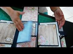 a person is cutting out some cards on a table