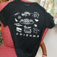 The Iconic Friends Tv Show. And I Have The T-Shirt For You. This Is A Size 7-9. A Sample From New York. This Is Not New With Tags But From A Showroom. It Is In Excellent Condition. And It's So Spot On Right Now, Since There Will Be A Friends Reunion. Black Pop Culture Top With Text Print, Black Pop Culture Text Print Top, Black Text Print Pop Culture Top, Fun Cotton T-shirt With Logo Print, Black Fun Fan Merchandise Top, Fun Black Top With Text Print, Fun Black Tops With Text Print, Black Relaxed Fit Fun T-shirt, Fun Black Relaxed Fit T-shirt