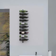 a wine rack mounted to the side of a wall