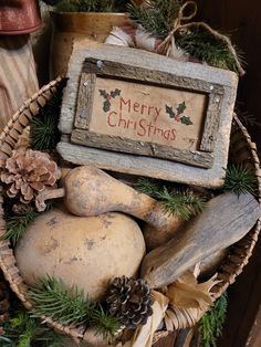 a basket filled with different types of christmas decorations