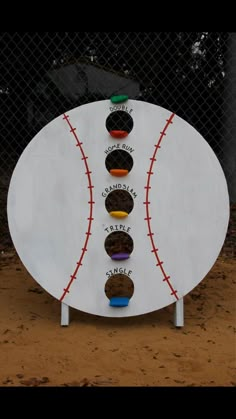 a baseball game board with six cookies on it