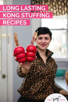 a woman holding up some red food in her hand with the words longlasing kong stuffing recipes on it