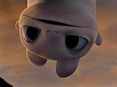 an animated cartoon character with blue eyes and large, pink nose looks up at the camera