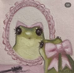 a painting of a frog with a pink bow on it's head next to a mirror