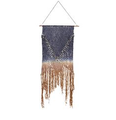 a blue and brown wall hanging with fringes on the end, in front of a white background