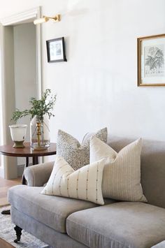 a living room filled with furniture and decor